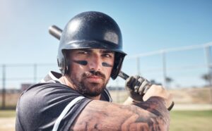 Baseball player using mouth guard. 