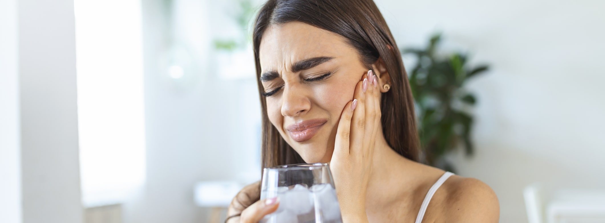 Woman with sensitive teeth